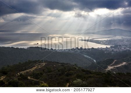 View of Ceuta from the Viewpoint of Isabel II. Spanish town in africa under the sun rays on a cloudy foggy day