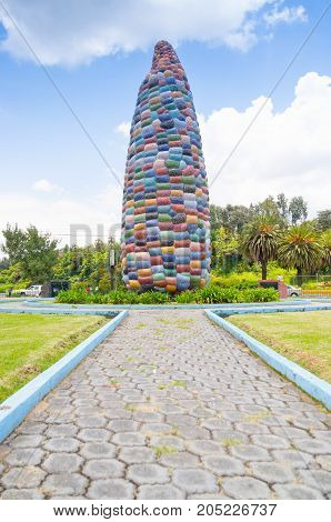Quito, Ecuador - 28 APRIL, 2015 Historic monument of a huge colorful corn in the valley of Los Chillos.