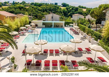 luxurious hotel swimming pool in Numana aerial view (Numana Italy 25 Jul 2017)
