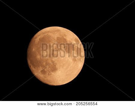 Photo of moon phase catching craters on it's surface