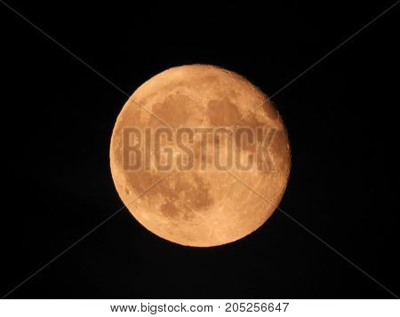 Photo of moon phase catching craters on it's surface