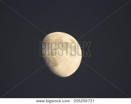 Photo of moon phase catching craters on it's surface
