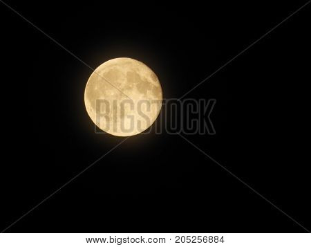 Photo of moon phase catching craters on it's surface