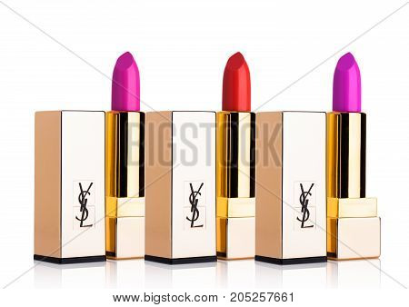 London, Uk - September 21, 2017: Golden Containers Of Luxury Yves Saint Laurent Lipstick On White  B