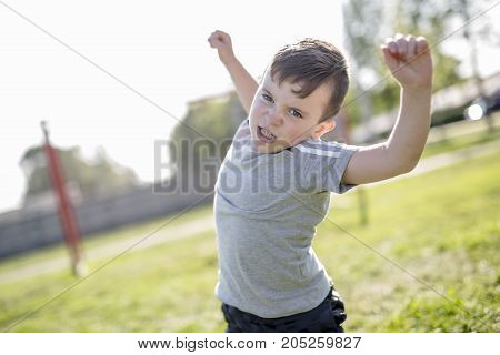 A Young caucassian soccer player football outside
