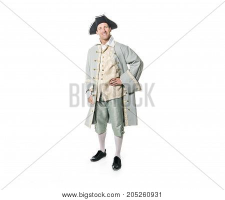 A man dressed as a courtier or prince on white background