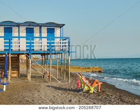 Beach Of Salerno With Beach Huts In Background. Campania, Italy.
