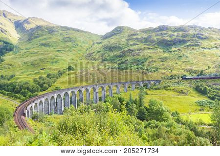 Glenfinnan - August 2014 : this railway built on the viaduct is located at Glenfinnan and attracts thousands of visitors which want to see the beautiful view from the train. This is a location of Herry Potter film