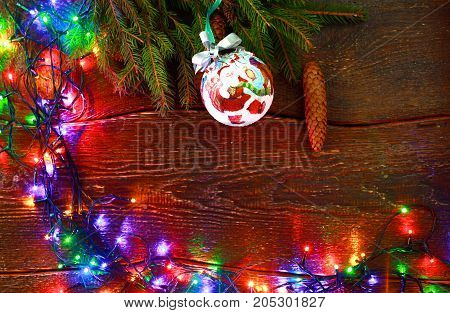 Christmas rustic background - vintage planked wood with lights and free text space.