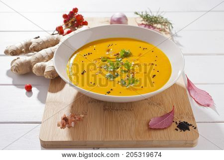 Carrot and pumpkin cream-soup. Vegetarian vegetables soup.