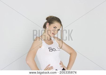 Pretty girl looking with interest on white backgraund