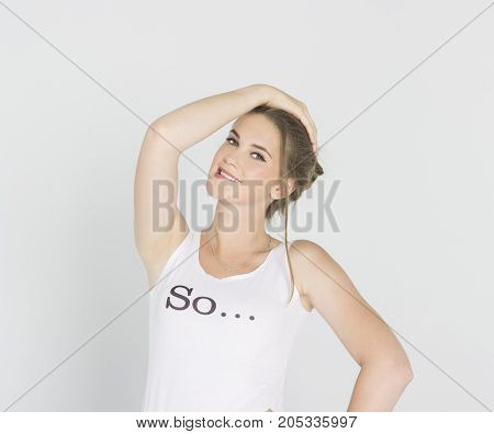 Pretty girl looking with interest on white backgraund