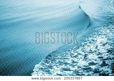Ionian sea. Blue sea water surface. Sea wave. Calabria, Italy