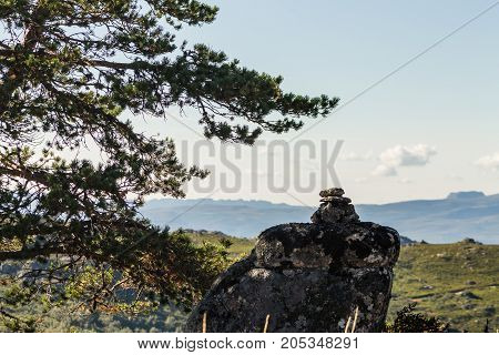 Pile of stones next to a path in the Natural park of Xures Galicia Northern Spain.