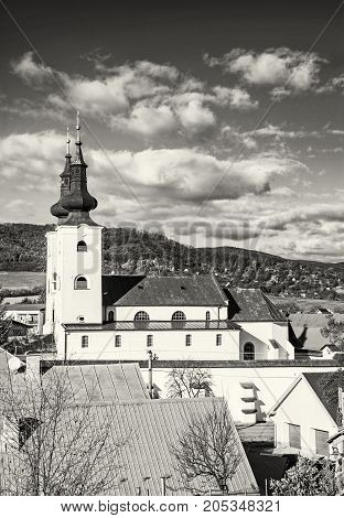 Roman catholic church in Divin village Slovak republic. Religious architecture. Cultural heritage. Black and white photo.