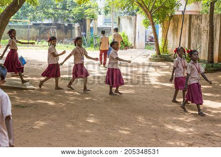 PONDICHERY PUDUCHERY INDIA - SSEPTEMBER 04 2017. School parade of each monday morning with children students in uniforms. They walk sing and pray before going in the classrooms.