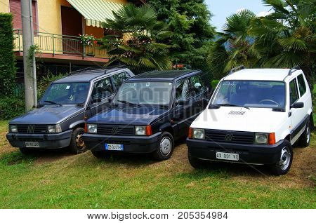 Endine Gaiano, Italy - August 18, 2017: Three Fiat Panda's compact cars parked by the side of the road. Nobody in de vehicles.