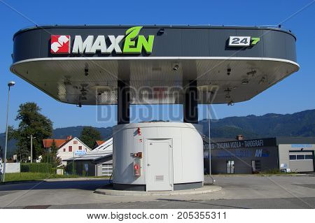 Koper, Slovenia - August 1, 2017: Maxen 24/7 selfservice gas station against a blue sky.