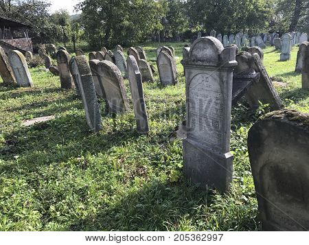 Teresva, Ukraine, September 18, 2017; An Old Jewish Cemetery. Shattered Gravestones Stand Among The