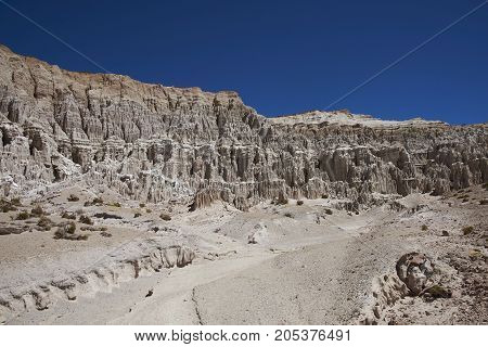 Eroded rock formations along Quebrada Chuba, a river valley high on the Altiplano of northern Chile in Lauca National Park.