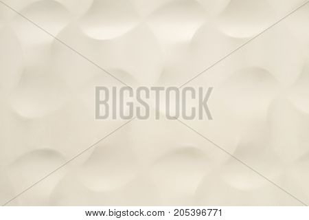 The dent on white background. White wall and round dented. Background and texture of white wall.