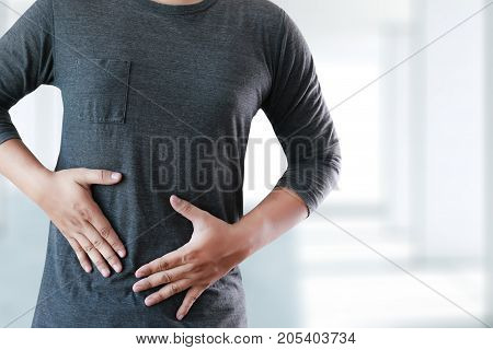 Man With Symptomatic Acid Reflux , Suffering From Acid Reflux