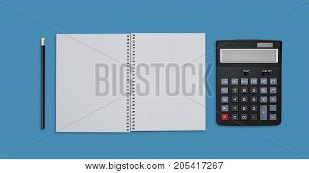 Office desktop and business concept. Blank spiral notebook calculator and pencil isolated over blue bckground. Worklplace of accountant or businessman. Top view of office supplies