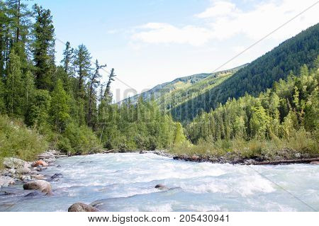 Russia, Republic of Altai. Very beautiful pictures of nature in Altai
High snow-capped mountains, fast, noisy mountain rivers, beautiful meadows and fields and woods - the nature of mountain Altai