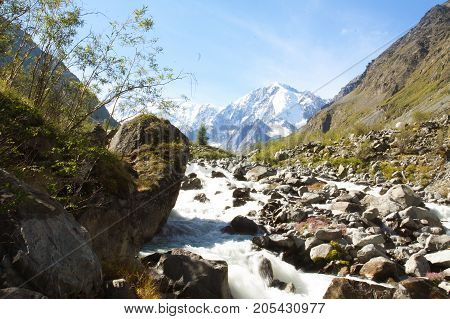 Russia, Republic of Altai. Very beautiful pictures of nature in Altai
High snow-capped mountains, fast, noisy mountain rivers, beautiful meadows and fields and woods - the nature of mountain Altai