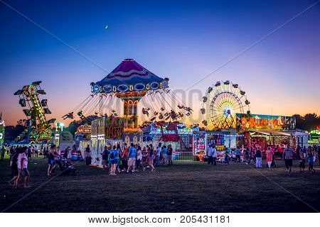 WEST WINDSOR NEW JERSEY - September 23 - Amusement park rides and plenty of people attended The 18th Annual Mercer County Italian American Festival on September 23 2017 in West Windsor NJ.