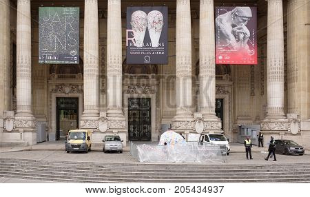 Paris; France- May 01; 2017: The Grand Palace is a majestic architectural building in the style of bos-ar. It is known as a cultural and exhibition center.Before the palace staff working