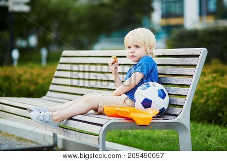 Little Boy With Lunchbox And Healthy Snack