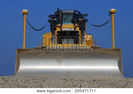 Lelystad, The Netherlands - September 24, 2017: Caterpillar (CAT) D6T LGP bulldozer sits at rest on landwinning construction site Marker Wadden.