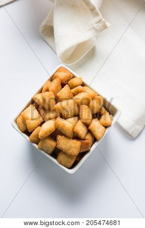 stock photo of  variety of Shakkar pare Also Know as Shakkarpare, Shakarpali, Shakkar Para, or Shankarpalli or shankar pale is a Snack Typically Made in India During Diwali