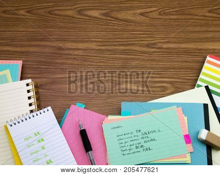 Mandarin; Learning New Language Writing Words On The Notebook