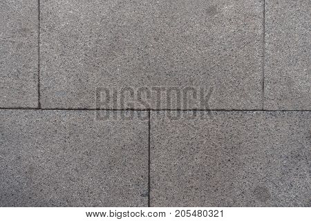 Closeup Of Pavement Made Of Grey Granite Blocks