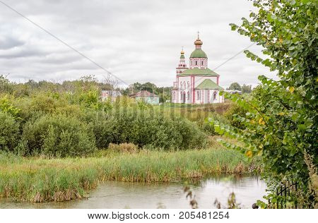 View of the Church of Elijah the Prophet on Ivanova mountain or Elias Church before the storm in Suzdal, Russia. Golden Ring of Russia.