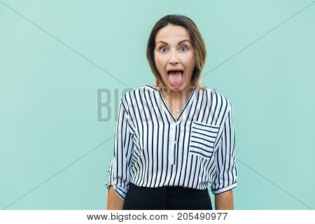 Happiness Businesswoman, Looking At Camera With Big Eyes And Tongue Out.