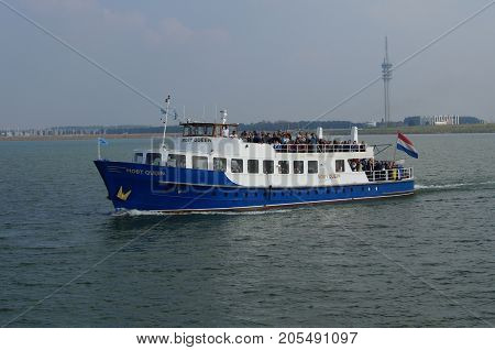 Lelystad, The Netherlands - September 24, 2017: Dutch Party ship Moby Queen sailing at the Markermeer near the city of Lelystad.