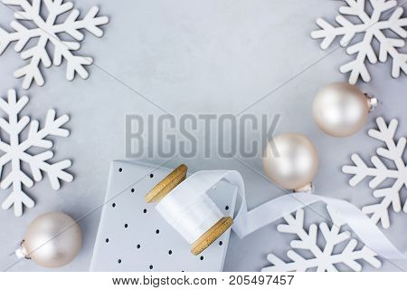 Christmas New Year Frame Arrangement Snow Flakes Baubles Gift Box White Silk Ribbon on Spool Greeting Card Poster Banner Template Copy Space