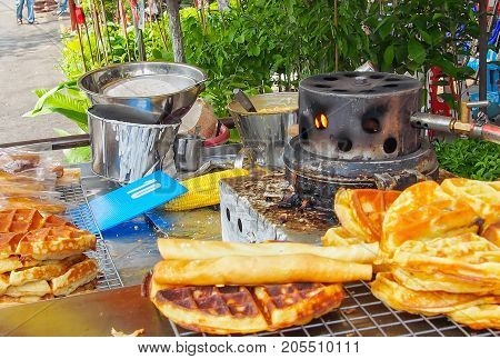 waffle dessert print out the pattern through the grill pan on the stove antique candy Thailand.