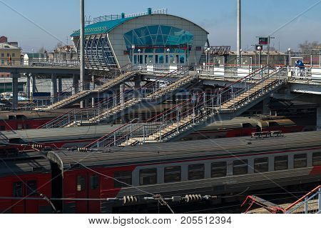 Novosibirsk, Russia - April 11, 2017: Trains on the railway tracks of the station in the city of Novosibirsk