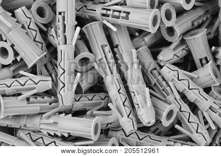 Some new gray plastic dowel close up