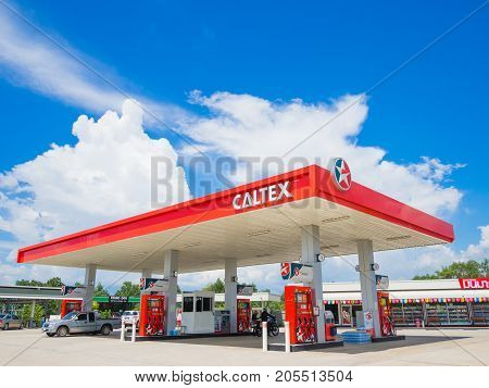 Trang Thailand - September 2 2017: Caltex gas station blue sky background. Caltex is a petroleum brand name of Chevron Corporation used in more than 60 countries.