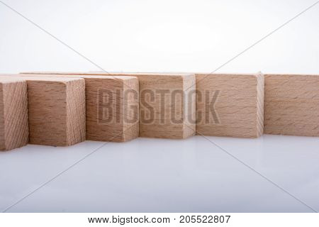 Wooden Domino Blocks On White Background