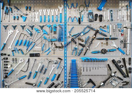 Stand With Set Tools On Bicycle Workshop