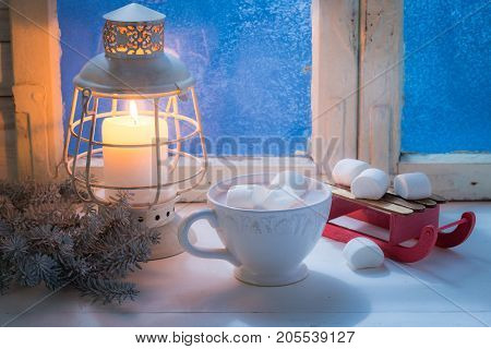 Enjoy Your Tasty Christmas Chocolate With Marshmallows And Candle