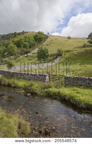 Malham Beck at Malham Cove Yorkshire Dales National Park England.