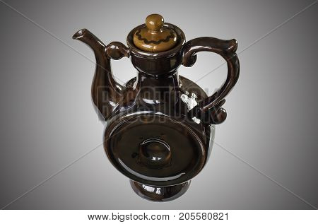 Oriental teapot for teahouses on white isolated background.