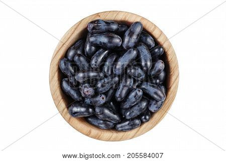 blue berries of grapes in a plate isolated on a white background